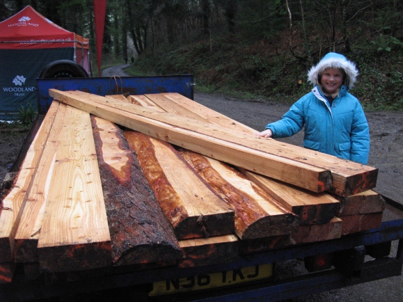 Laura inspects the timber for new raised beds at Okehampton Primary School